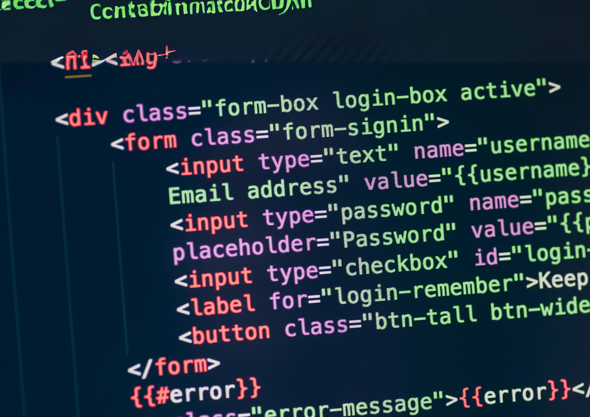 A close-up view of a computer screen displaying HTML code for a login form, including fields for email address and password, with syntax highlighting.